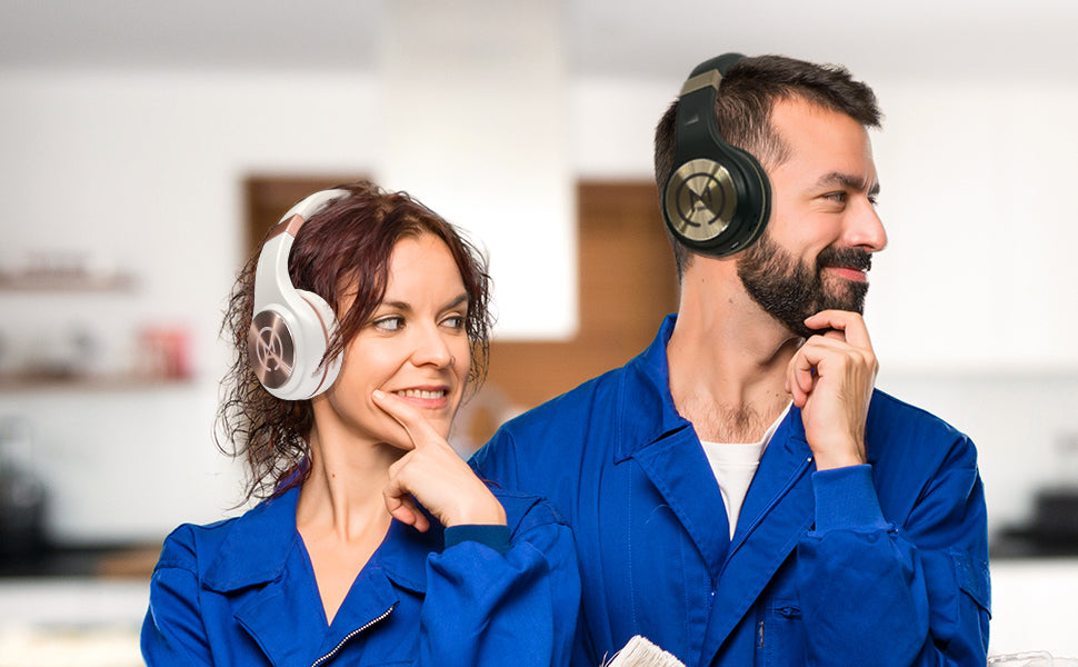 Photo of Morpheus 360 Serenity Wireless Over Ear Headphones with a Hispanic male and female modeling the Serenity Wireless Headphones.